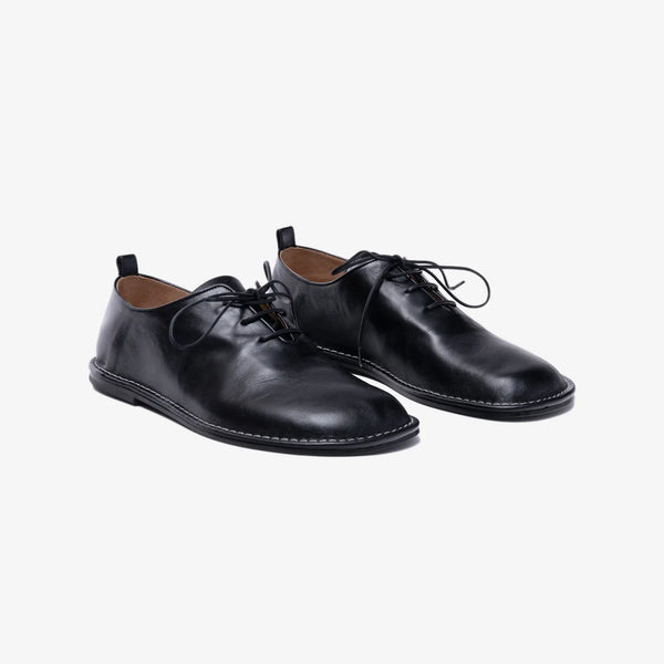 AMI Paris Texture One Cut Shoes in Black